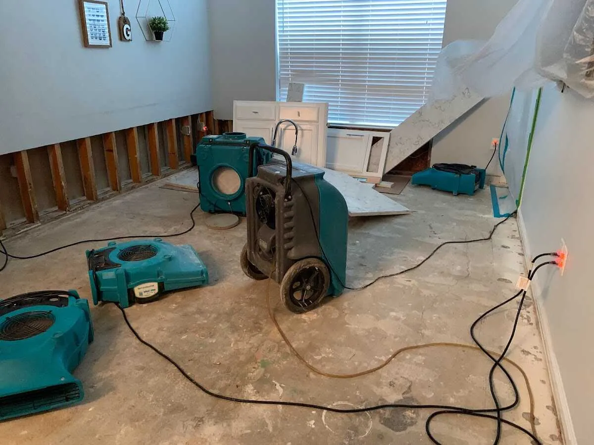 Dehumidifier in flood-cut room for Water Damage Restoration in Stone Ridge